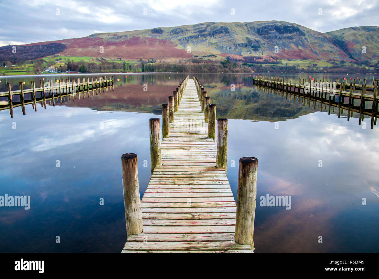A wooden pier at Ullswater lake in the English Lake District Stock Photo