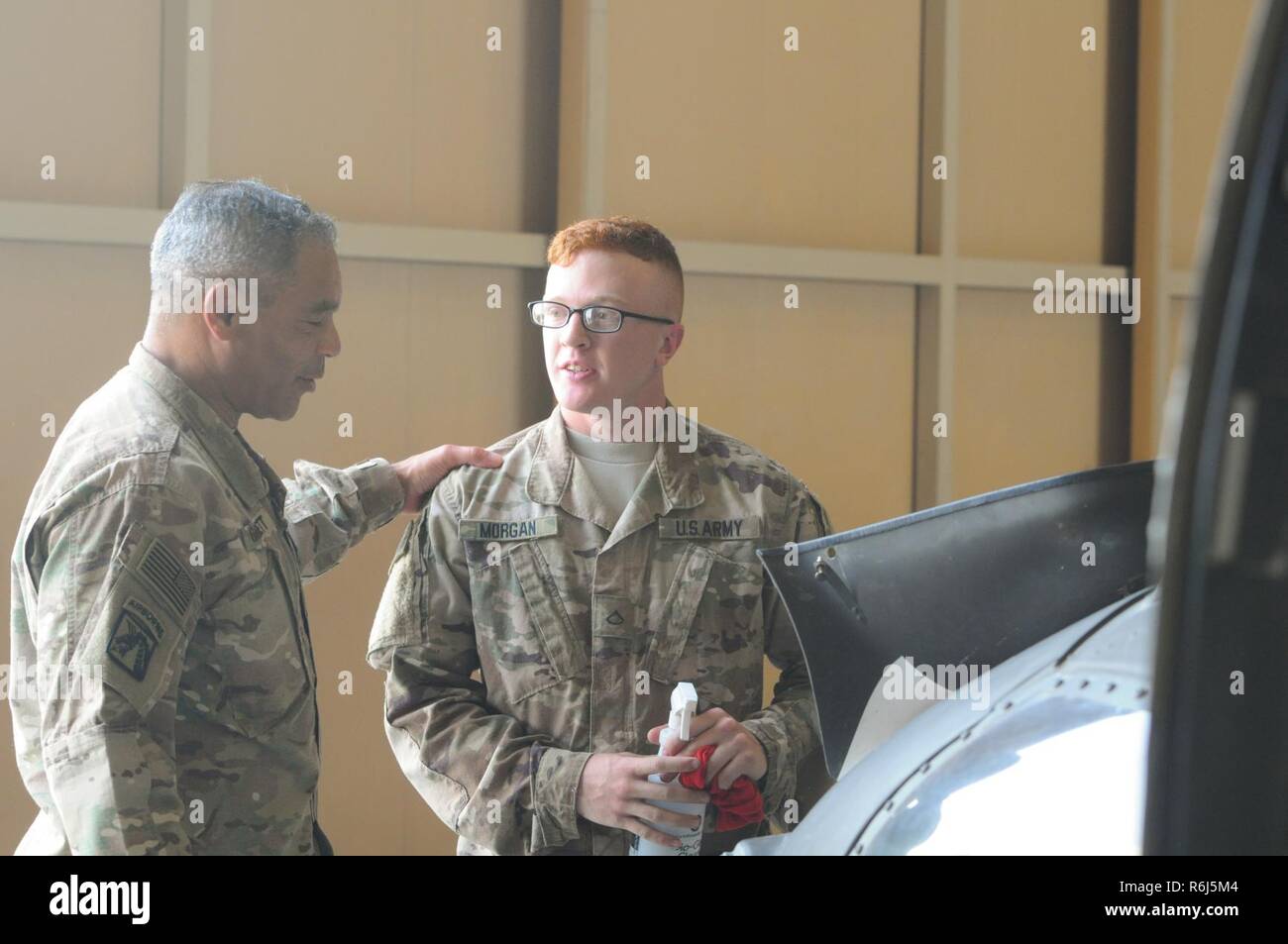 The Commanding General of U.S. Army Central Lt. Gen. Michael X. Garrett, met with Soldiers from the 449th Aviation Support Battalion on May 19 at Camp Buehring, Kuwait. During this visit, Lt. Gen. Garrett recognized 449th ASB Soldiers for their achievements and received information on how the 449th ASB supports 29th Combat Aviation Brigade operations throughout USARCENT. Stock Photo