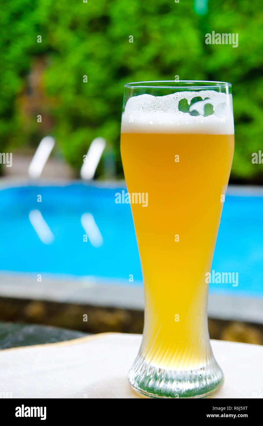 beer near the pool outdoors Stock Photo Alamy