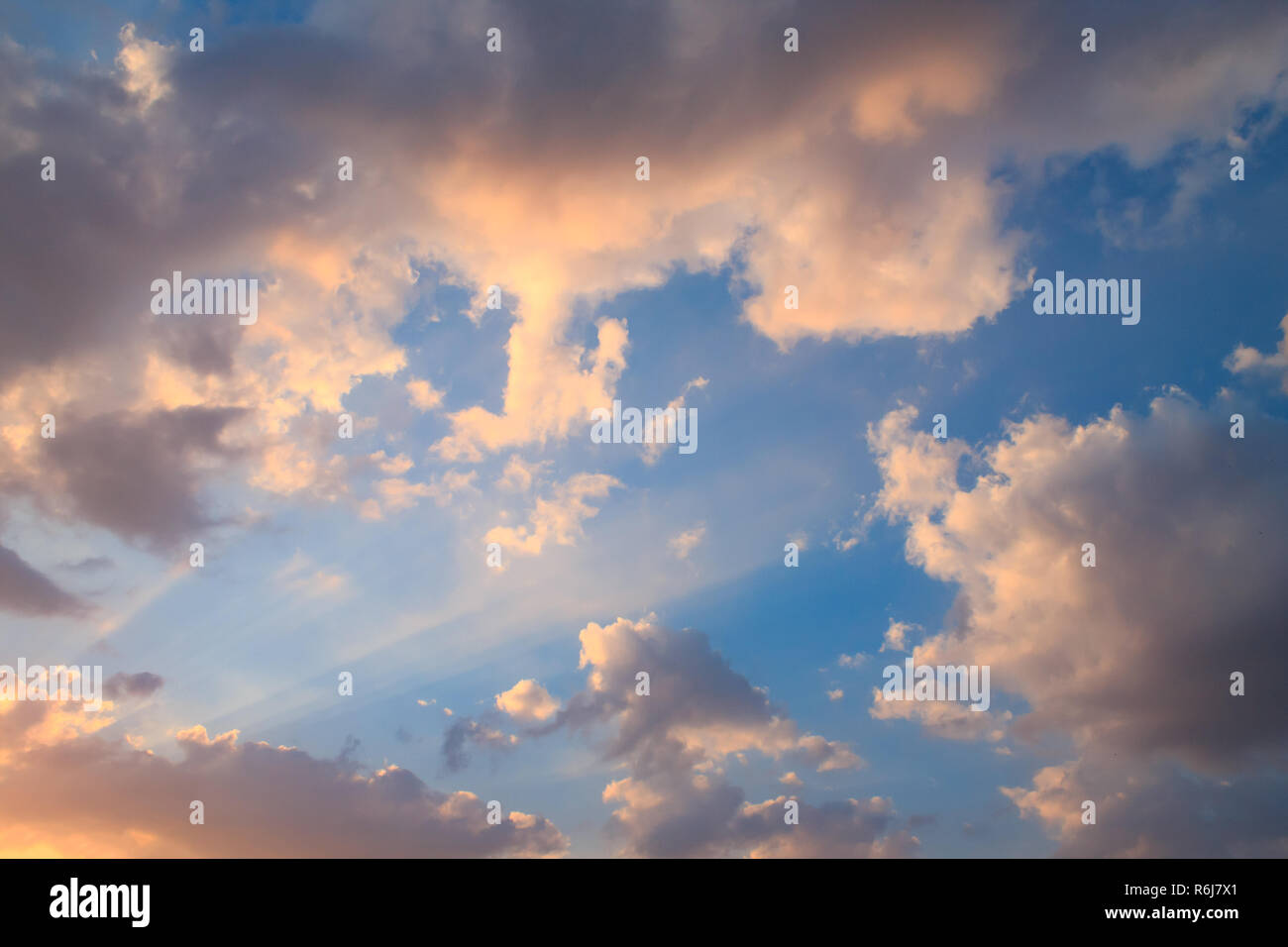 Beautiful sunset clouds with blue sky background Stock Photo - Alamy