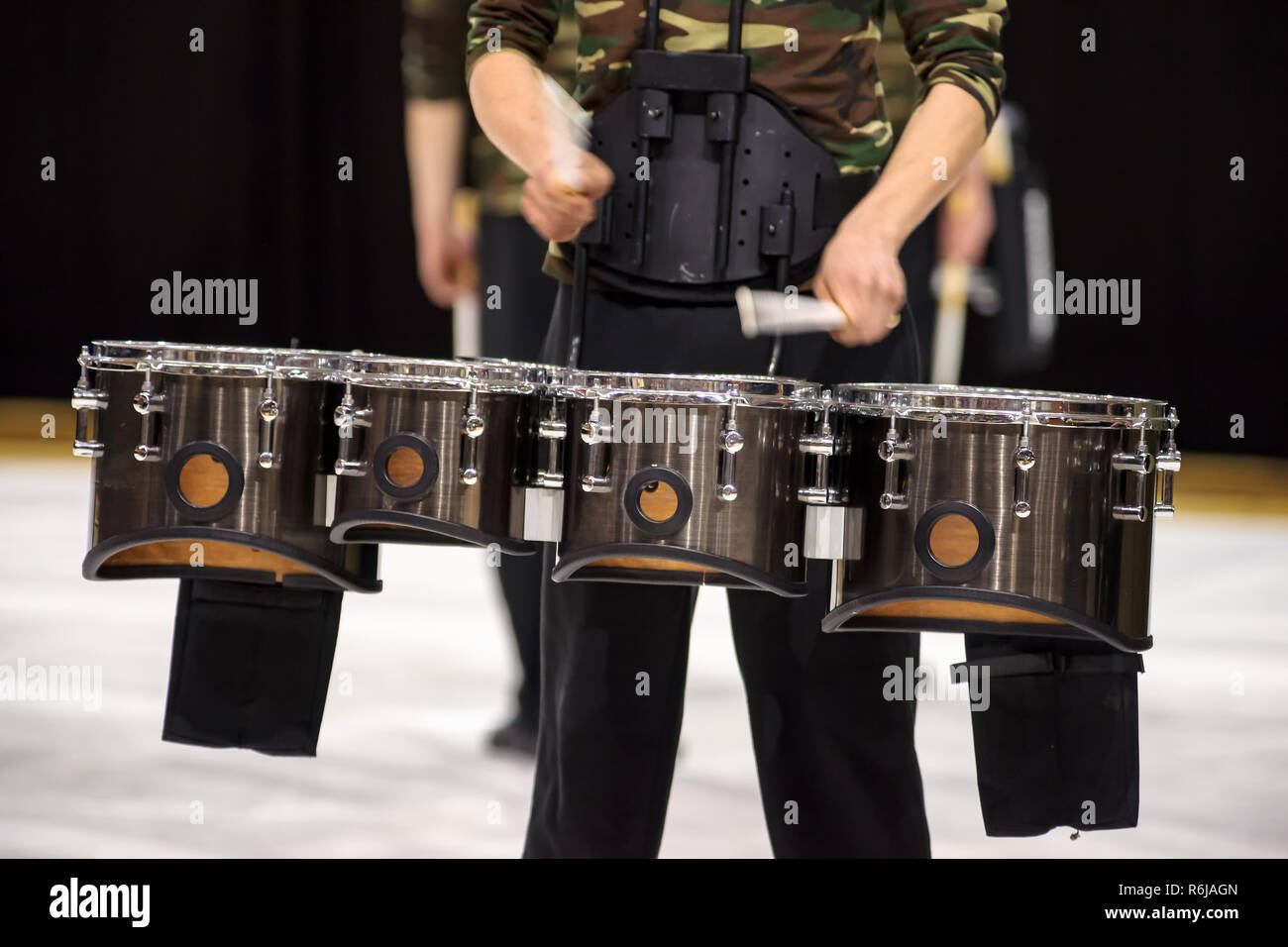 Percussion instrument with different tuned drums that are used in drum