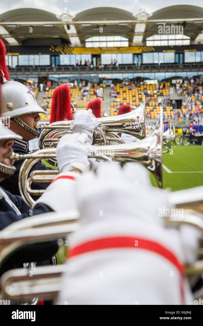Details from a music, show and marching band. Playing musicians wind