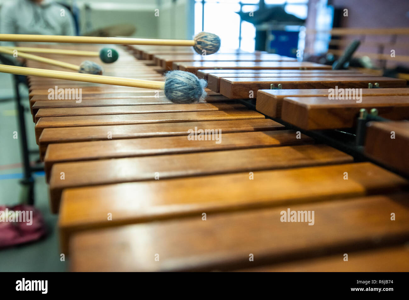 Musician in action with percussion instrument during a concert or