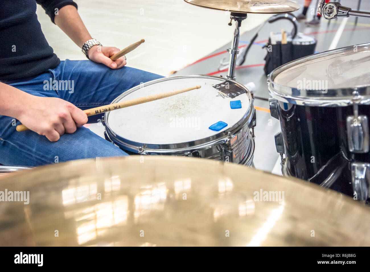 Drummer playing on drum set top view. Live music concert, band during performance. View and look