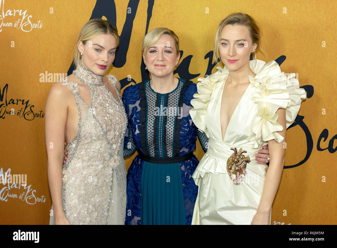 New York, USA. 4th Dec, 2018. (L-R) Margot Robbie, Josie Rourke, and Saoirse Ronan attend the New York premiere of 'Mary, Queen of Scots' at the Paris Theater in New York City on December 4, 2018. Credit: Jeremy Burke/Alamy Live News Stock Photo