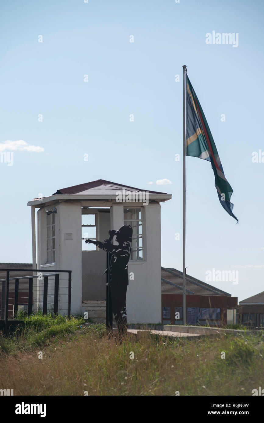 Johannesburg, South Africa, 5 December, 2018. A silhouette figure keeps guard over the Old Fort on Constitution Hill. The Old Fort, a prison since the 1800s, was also used a military garrison during the Anglo-Boer War. Former South African President Nelson Mandela was once held prisoner here among other political prisoners. Today, the Fort is a living museum. On this day, 5 December, 2013, Nelson Rolihlahla Mandela died. Eva-Lotta Jansson/Alamy Live News Stock Photo