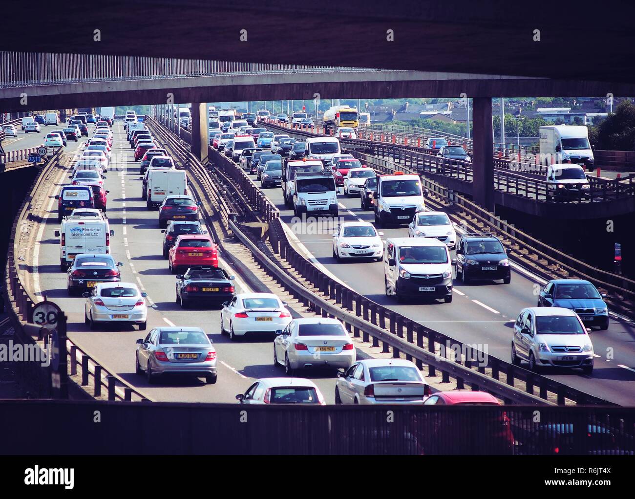A busy M8 motorway in Glasgow City center during a daily rush hour traffic. Stock Photo