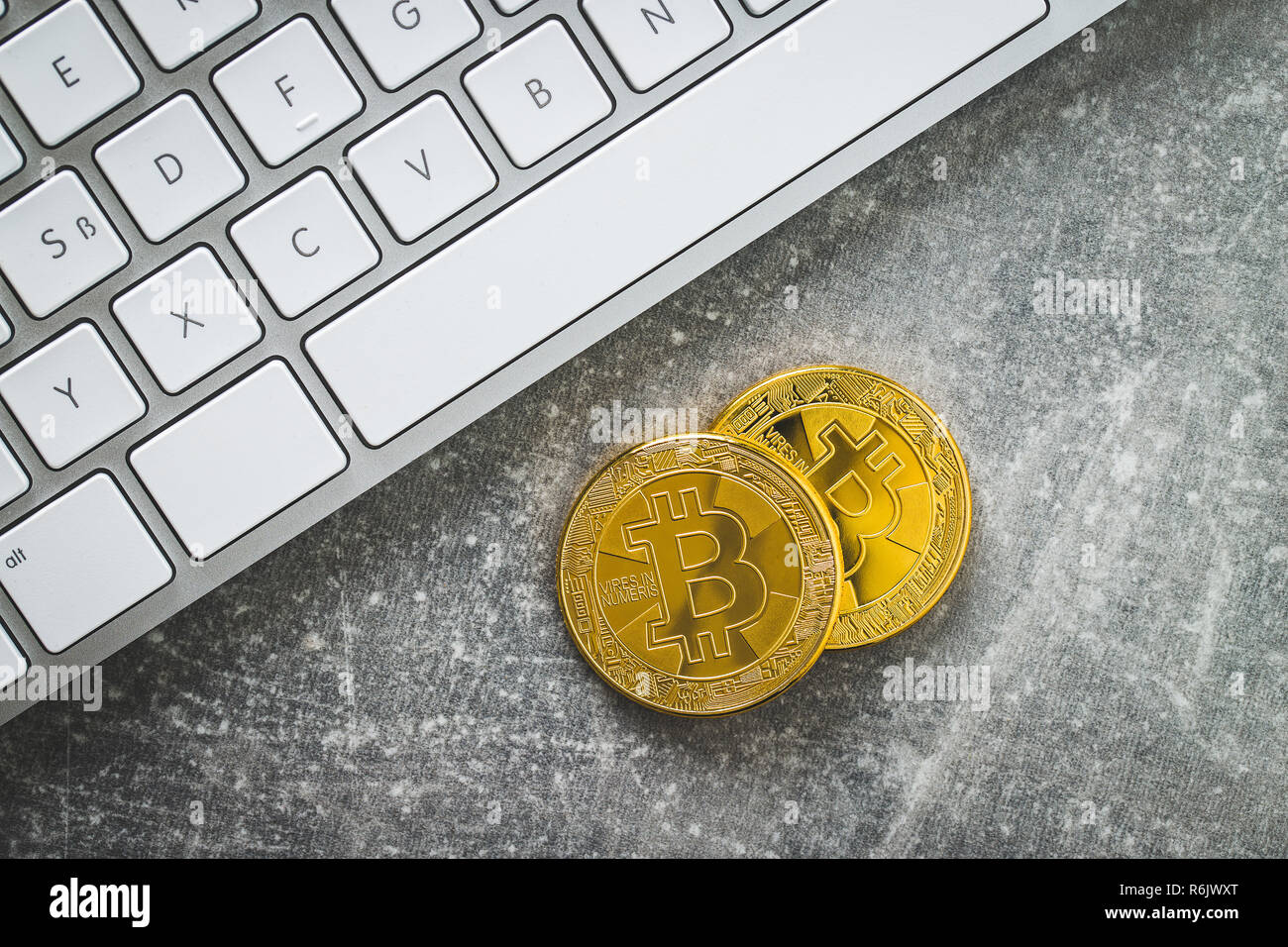 Bitcoin Computer Size Golden coin bitcoin. Cryptocurrency concept and computer keyboard Stock ...