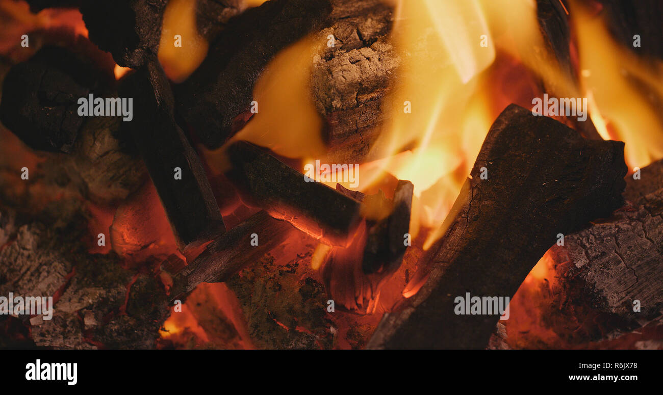 Charcoal burns in the fire Stock Photo Alamy