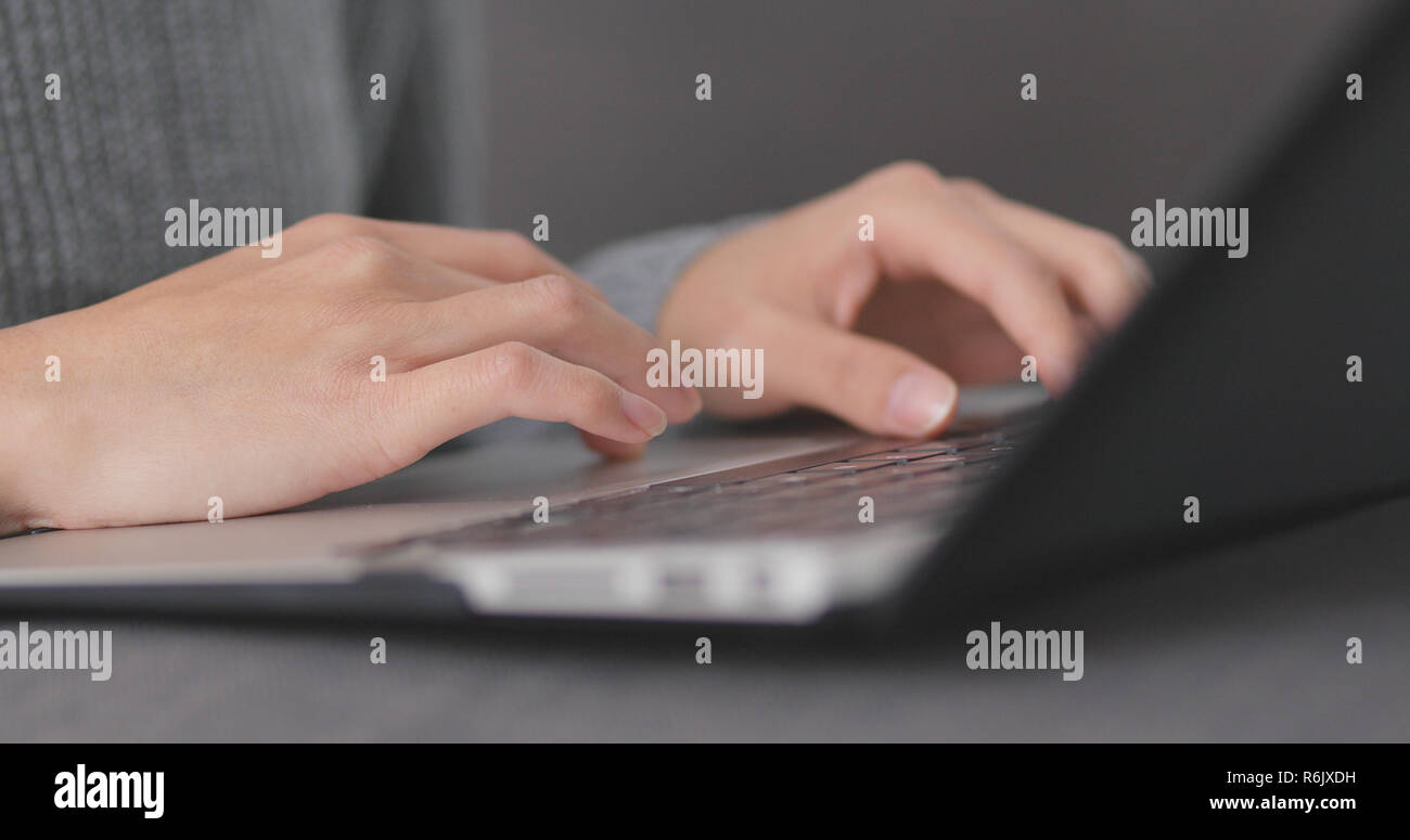 Laptop Computer While Working Working on laptop computer Stock Photo - Alamy