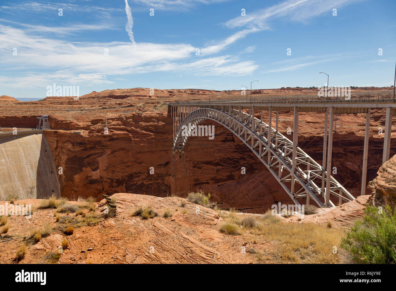 Glen Canyon Dam is a concrete arch-gravity dam on the Colorado River in northern Arizona, United States, near the town of Page. The 710-foot high dam Stock Photo