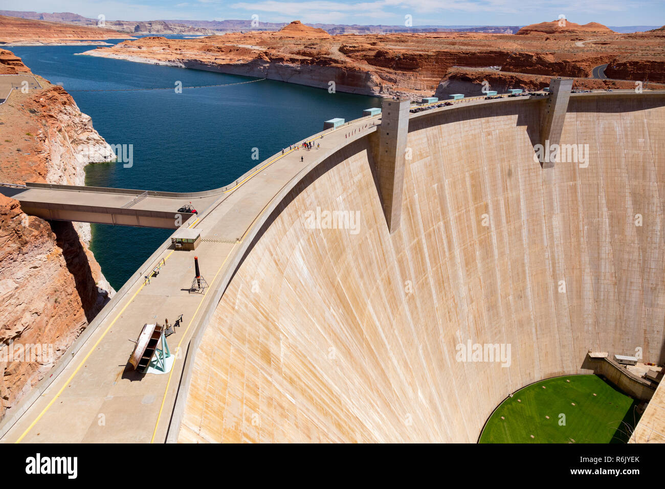 Glen Canyon Dam is a concrete arch-gravity dam on the Colorado River in northern Arizona, United States, near the town of Page. The 710-foot high dam Stock Photo