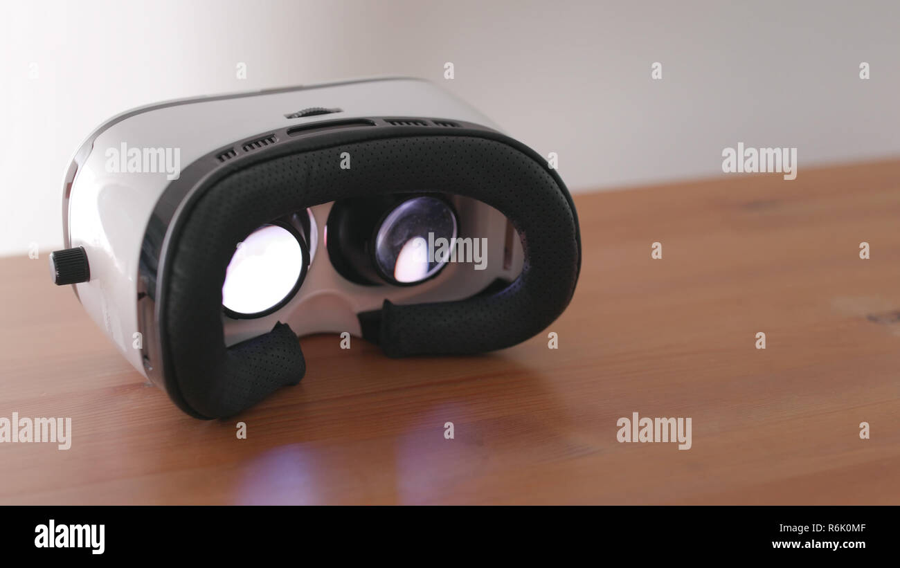 Desk computers virtual reality goggles hi-res stock photography and ...