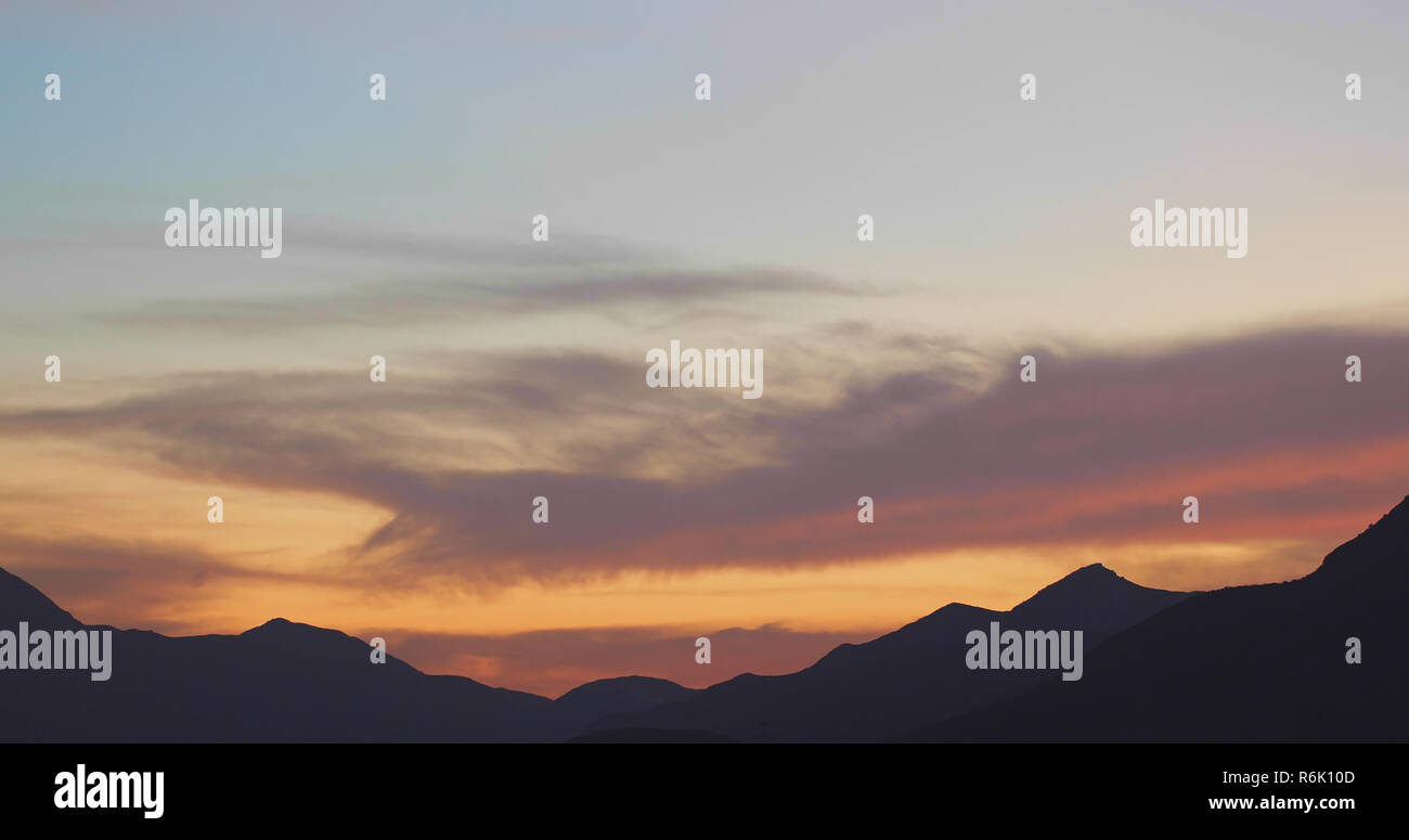 Sunset and mountain Stock Photo - Alamy