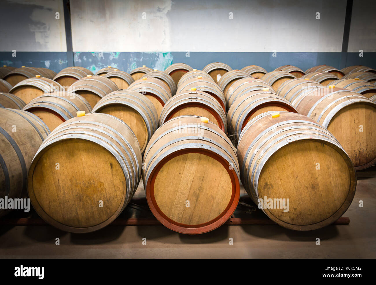 Wine barrels in the cellar of the winery Stock Photo Alamy