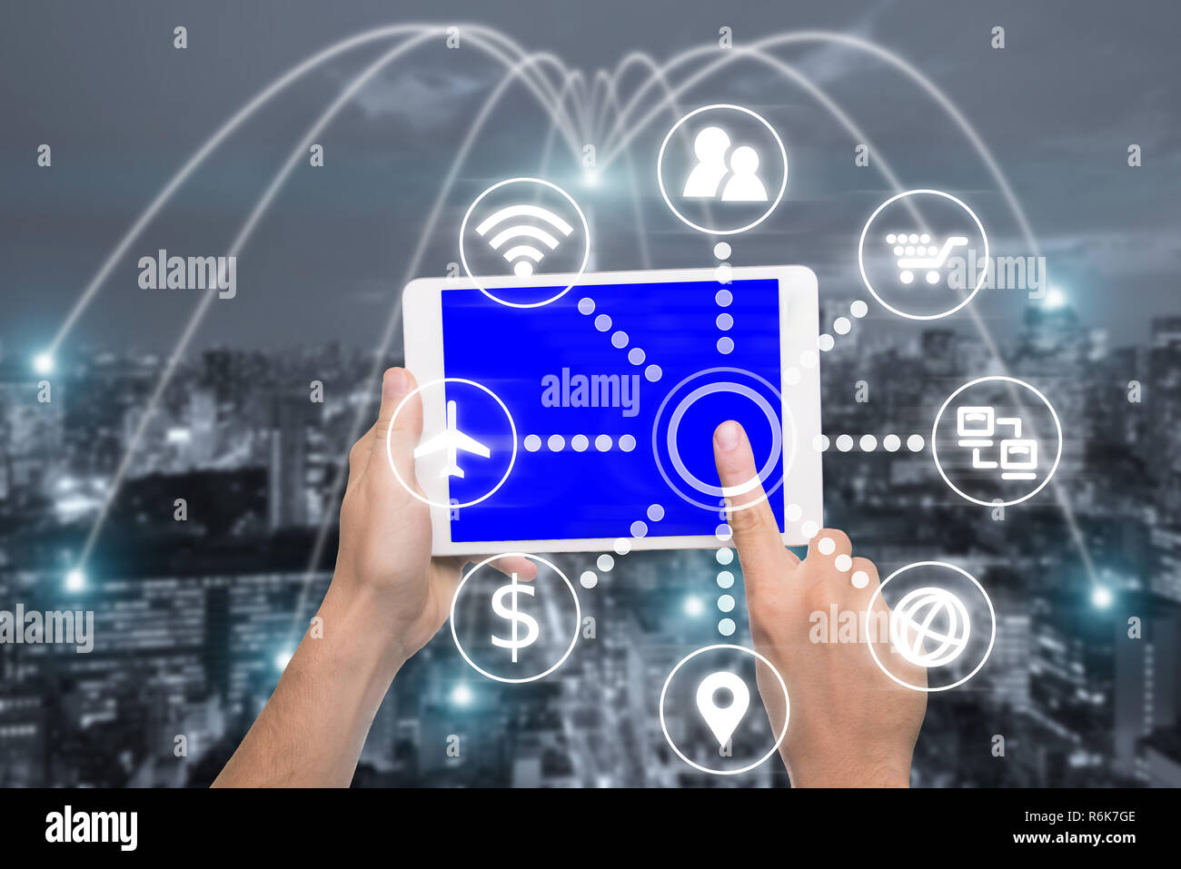 Hand holding digital tablet with smart technology icon and Tokyo city with network connection concept, Tokyo smart city and wireless communication net Stock Photo