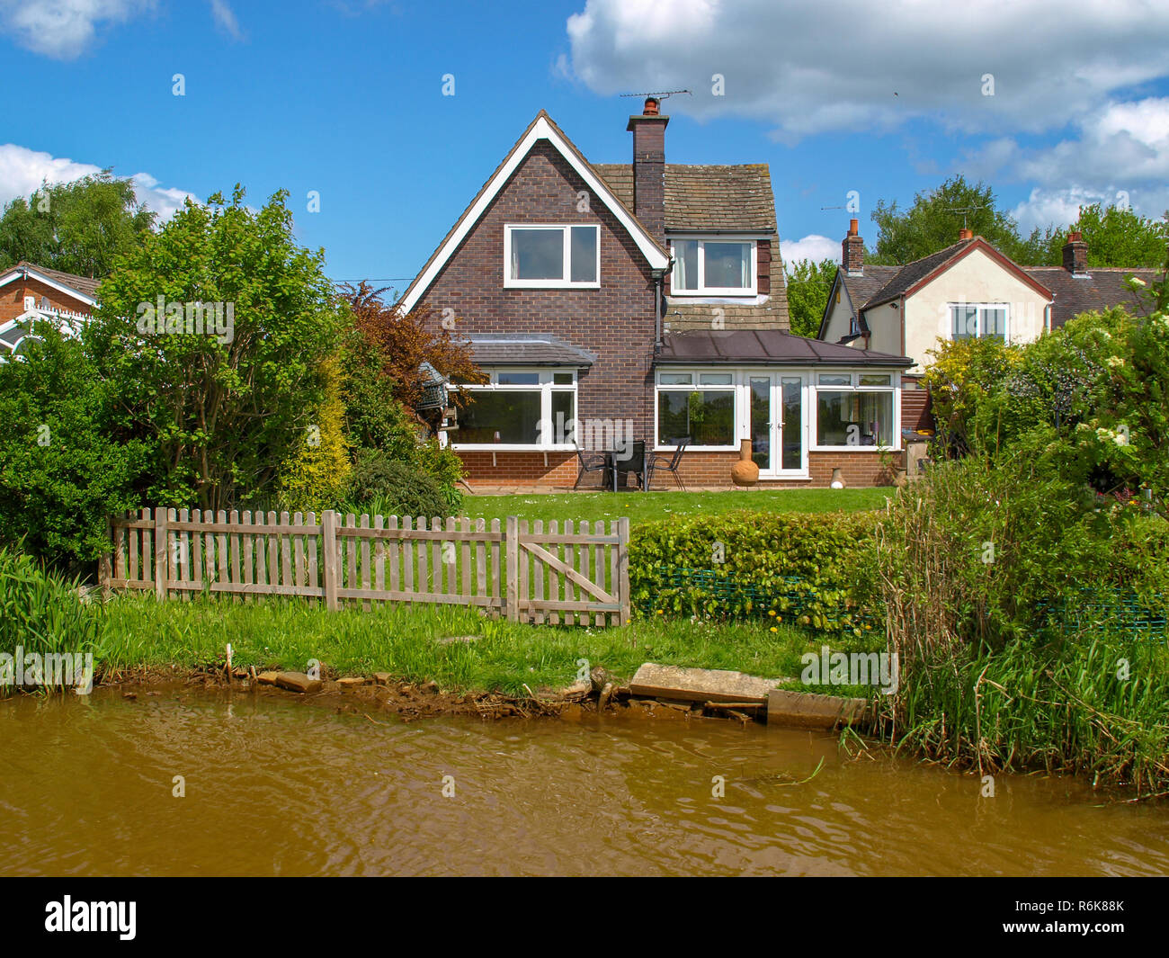 Canalside house on the Trent and Mersey Canal in the West Midlands in
