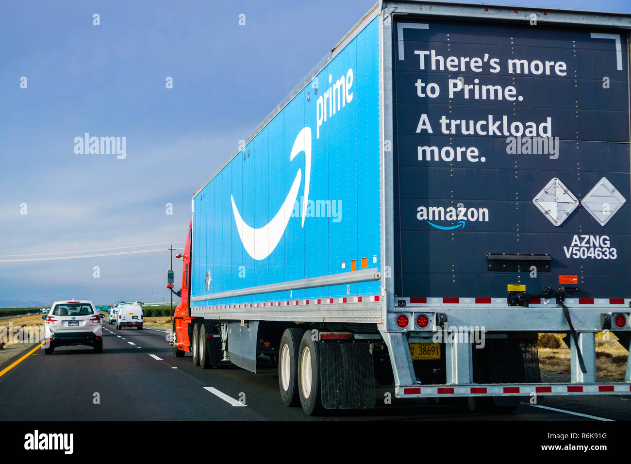 December 2, 2018 Los Angeles / CA / USA - Amazon truck driving on the interstate, the large Prime logo printed on the side Stock Photo