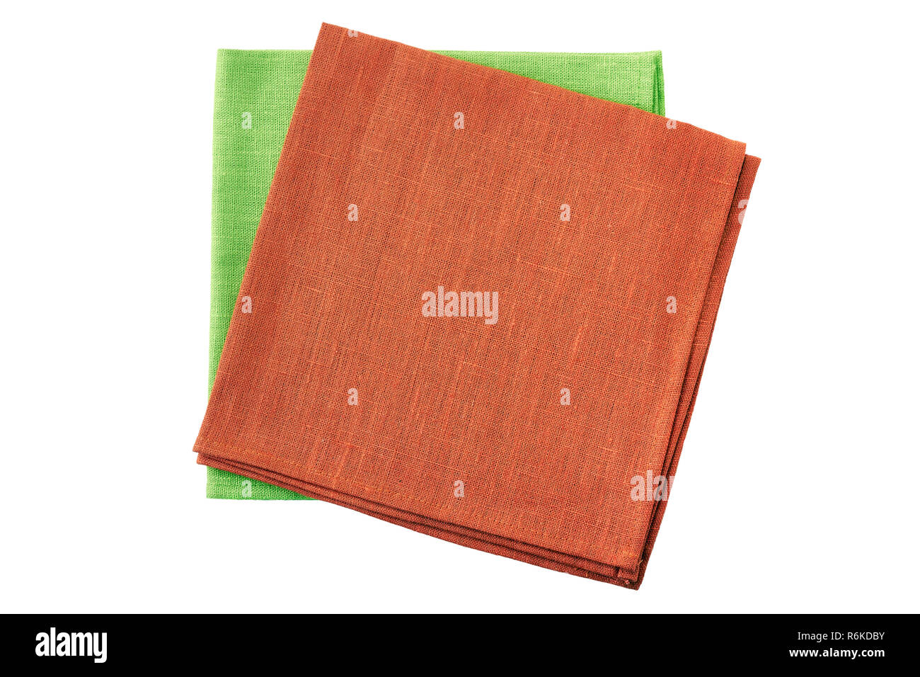 Stack of red and pale green folded napkins isolated on white background