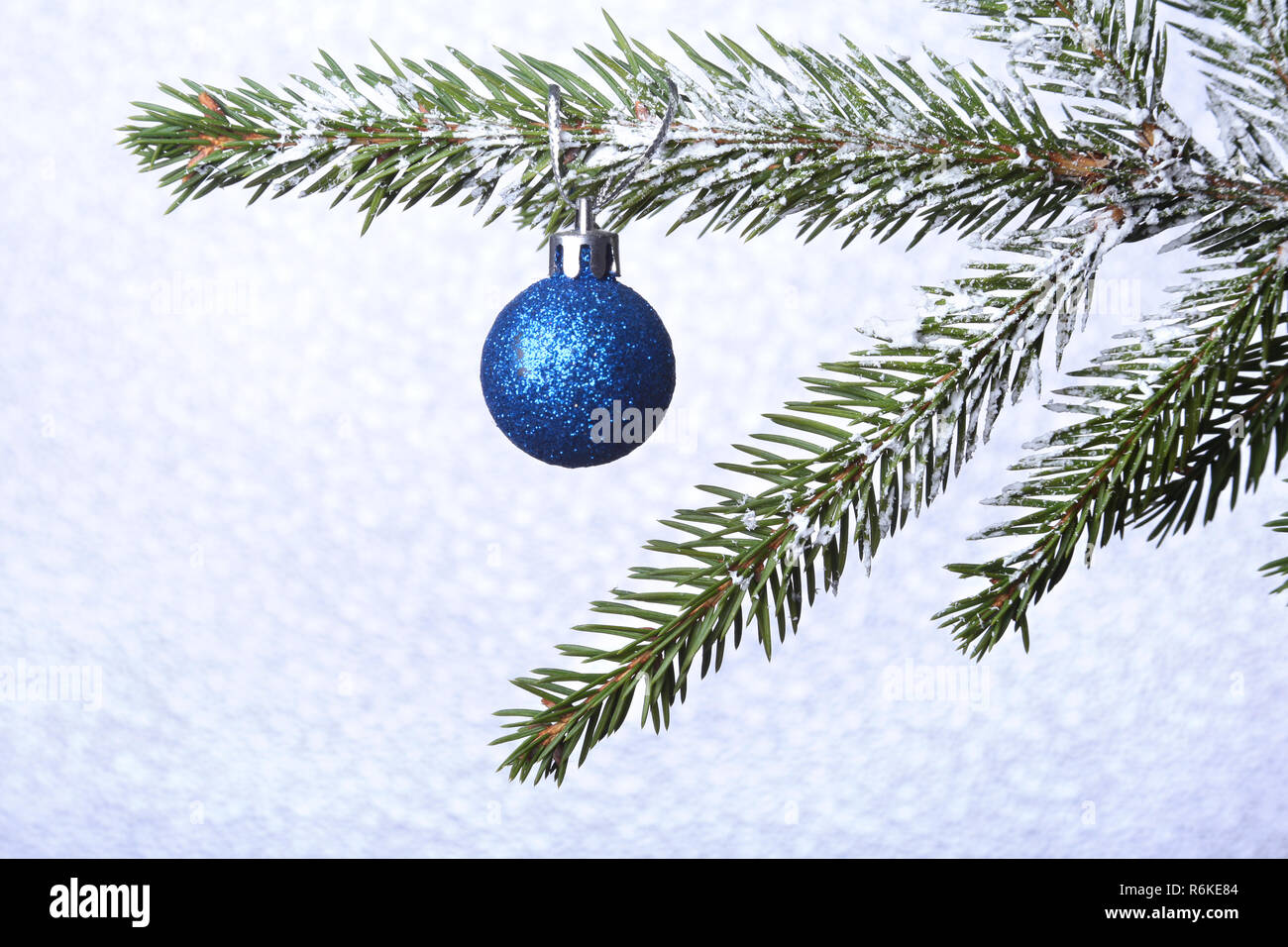 Christmas tree and New Year's colorful balls with ribbon on blurred ...