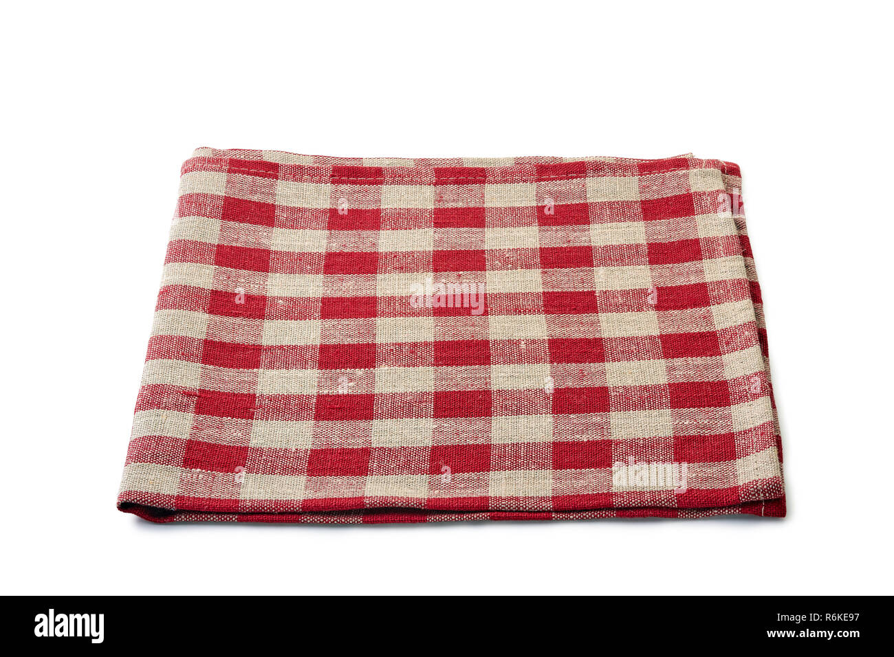 Red checkered folded textile napkin on white background Stock Photo