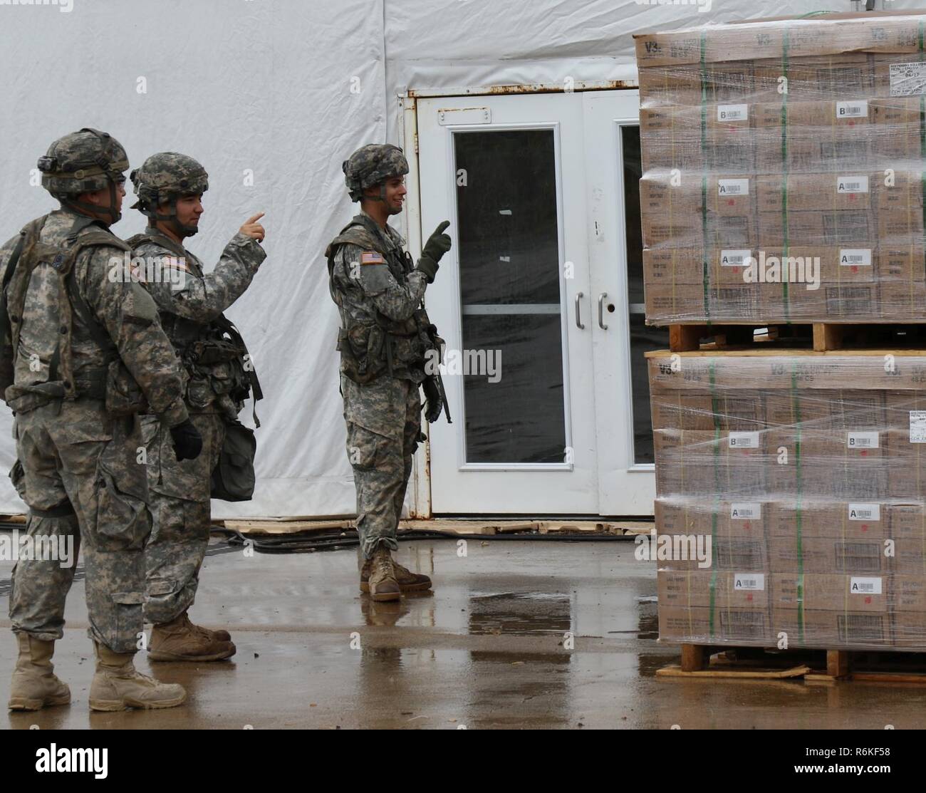 U.S. Army Reserve Soldiers with the 79th Quartermaster Company based in Houston, Texas, count pallets of Meals Ready-to-Eat during Joint Readiness Training Center (JRTC) Rotation 17-07, at Fort Polk, Louisiana, May 5 to 26, 2017.  JRTC provides America’s military forces relevant, rigorous, multi-echelon training in a decisive action and mission rehearsal exercise environment to develop adaptive leaders, confident units, and robust capabilities across the range of military operations achieving Army readiness. Stock Photo