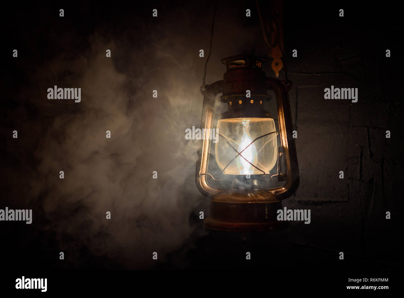 vintage lantern on a dark background smoke Stock Photo