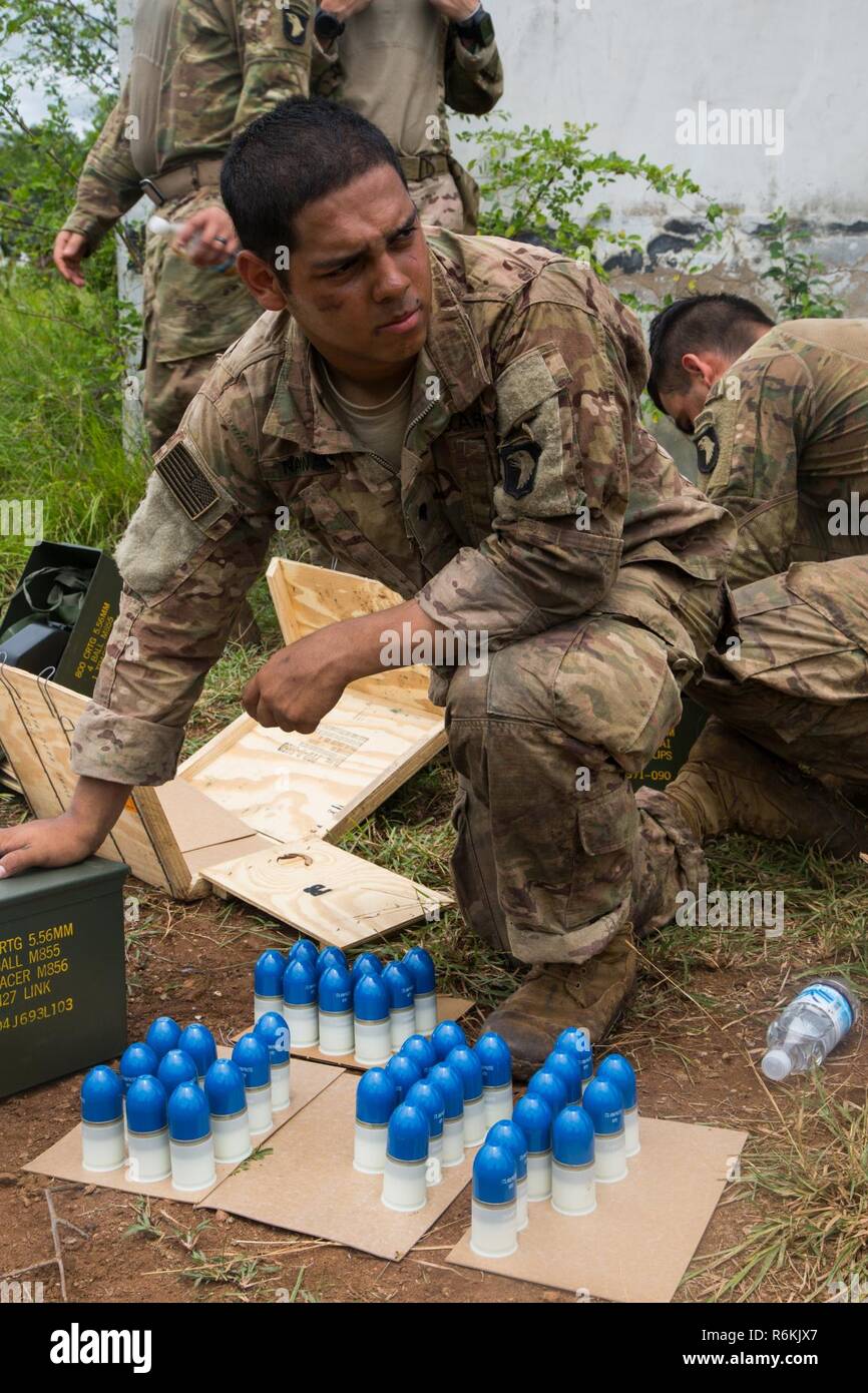 A U.S. Soldier assigned to the 1st Battalion, 506th Infantry Regiment, 1st Brigade Combat Team, 101st Airborne Division makes accountability of the ammunitions during United Accord 2017 at Bundase Training Camp, Bundase, Ghana, May 26, 2017. United Accord (formerly Western Accord) 2017 is an annual, combined, joint military exercise that promotes regional relationships, increases capacity, trains U.S. and Western African forces, and encourages cross training and interoperability. Stock Photo