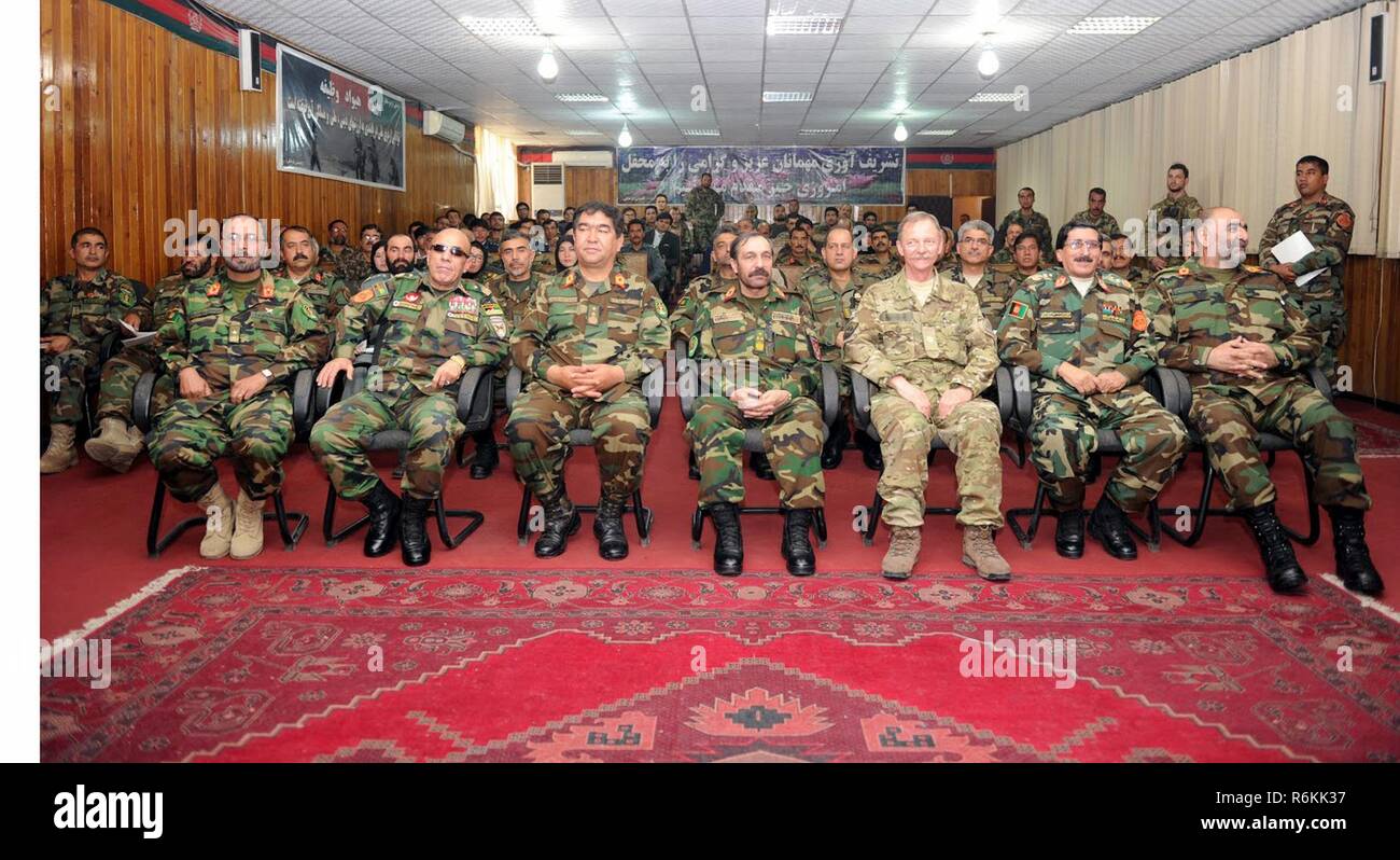 KABUL, Afghanistan (May 27, 2017) — Ministry of Defense newest graduated class of inspectors general empowered to conduct inspections at all levels of the Afghan military to eradicate corruption and instill accountability. Also in the photo, Danish Brig. Gen. Christian Arildsen, director of Transparency, Accountability and Oversight for Resolute Support. Stock Photo