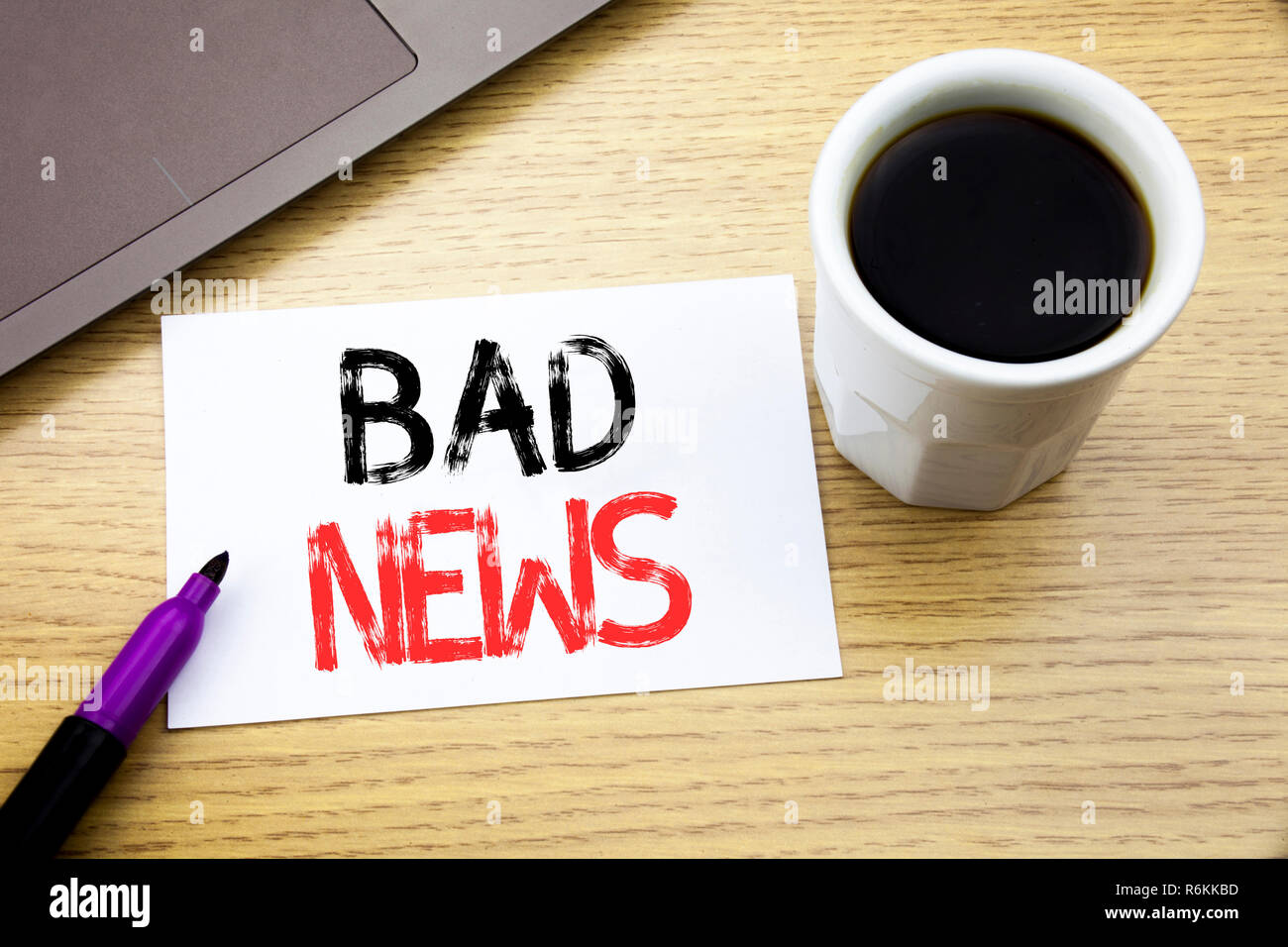 Handwriting Announcement text showing Bad News. Business concept for Failure Media Newspaper written on notebook book on the wooden background in the Office with laptop coffee Stock Photo