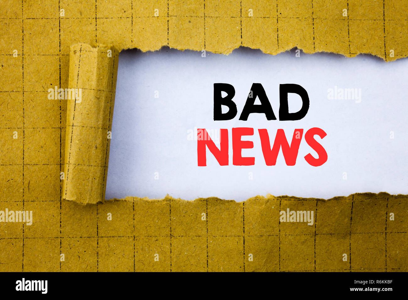 Bad News. Business concept for Failure Media Newspaper written on white paper on the yellow folded paper. Stock Photo