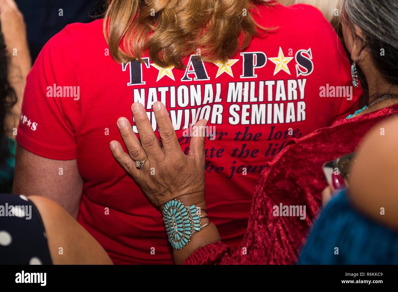 Surviving family members support each other after the Tragedy