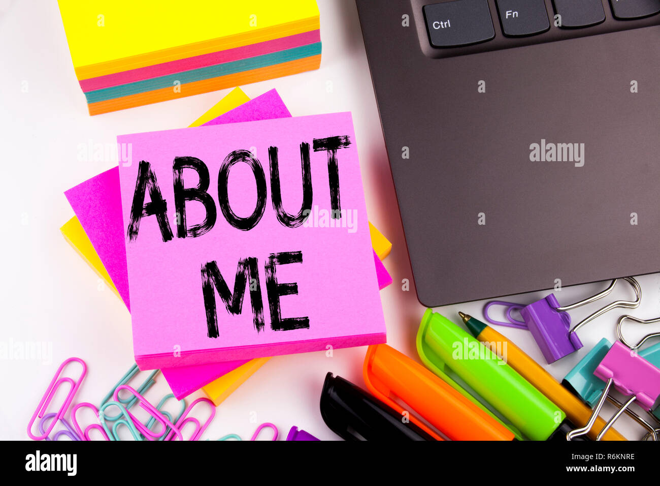 Writing text showing About Me made in the office with surroundings such ...