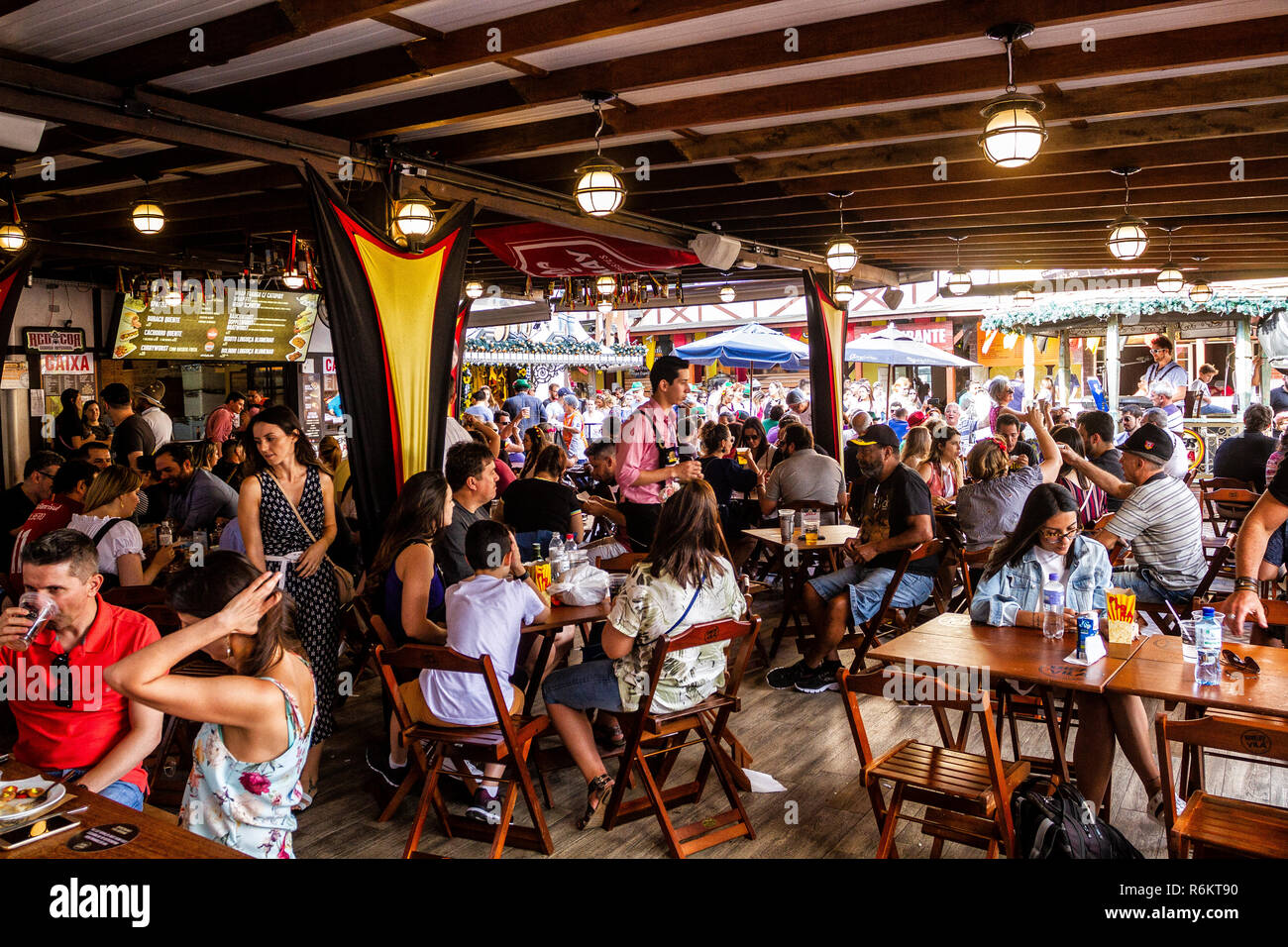 People seen at the restaurant during the festival. Oktoberfest 2018 is a Germany beer festival in Blumenau, a Brazilian city founded by German immigrants. Blumenau, Santa Catarina, Brazil. Stock Photo