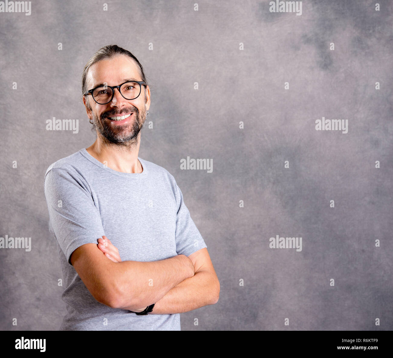 Young man long beard laughs hi-res stock photography and images - Alamy