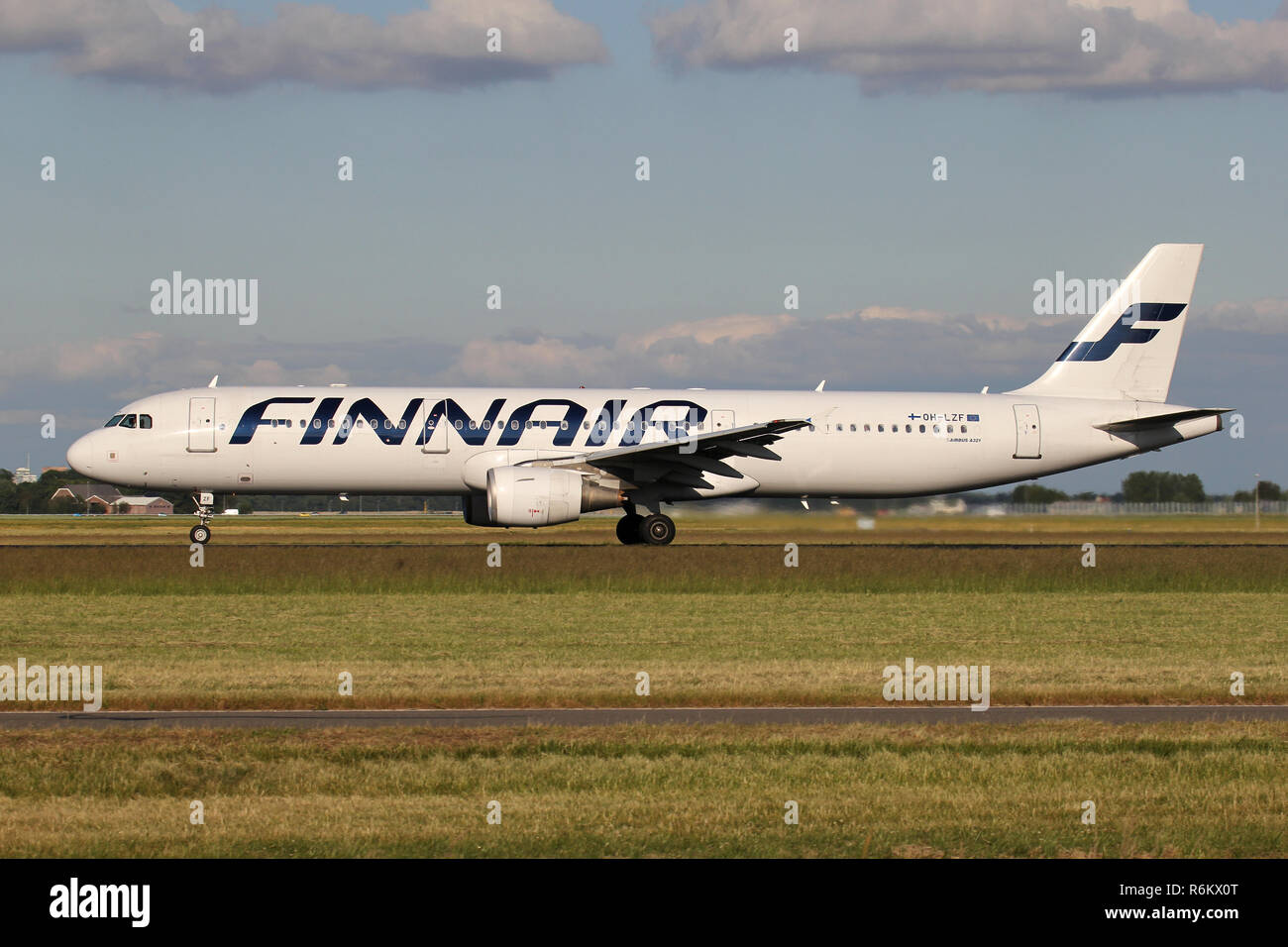 Finnair Airbus A321-200 with registration OH-LZF on take off roll