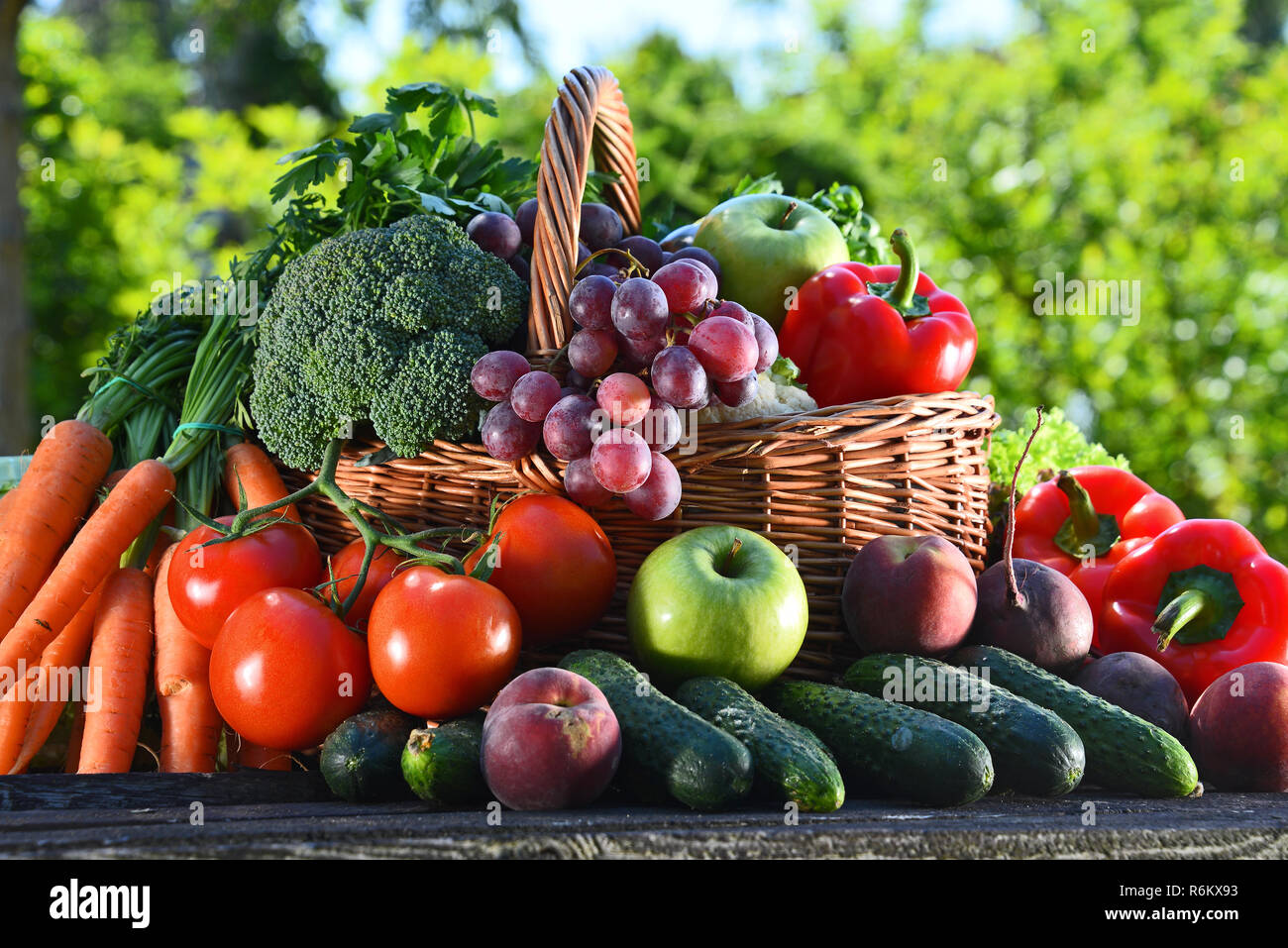 Variety of fresh organic vegetables and fruits in the garden Stock ...