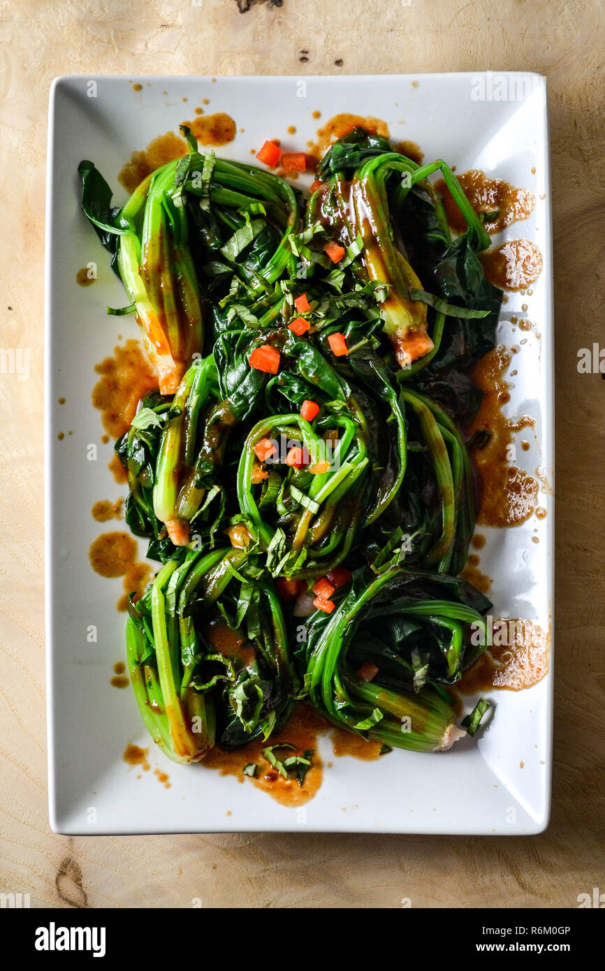 Blanched taiwanese spinach with a spicy hoisin sauce (Chinese cooking) Stock Photo