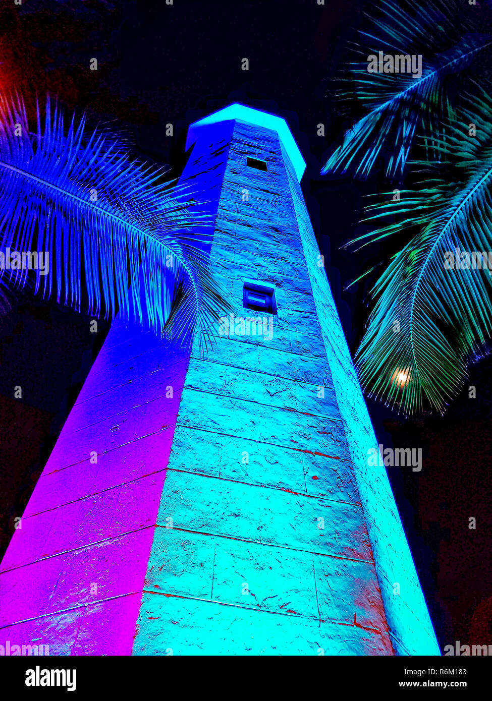 Night view with colored lights of Needham's Point lighthouse, located
