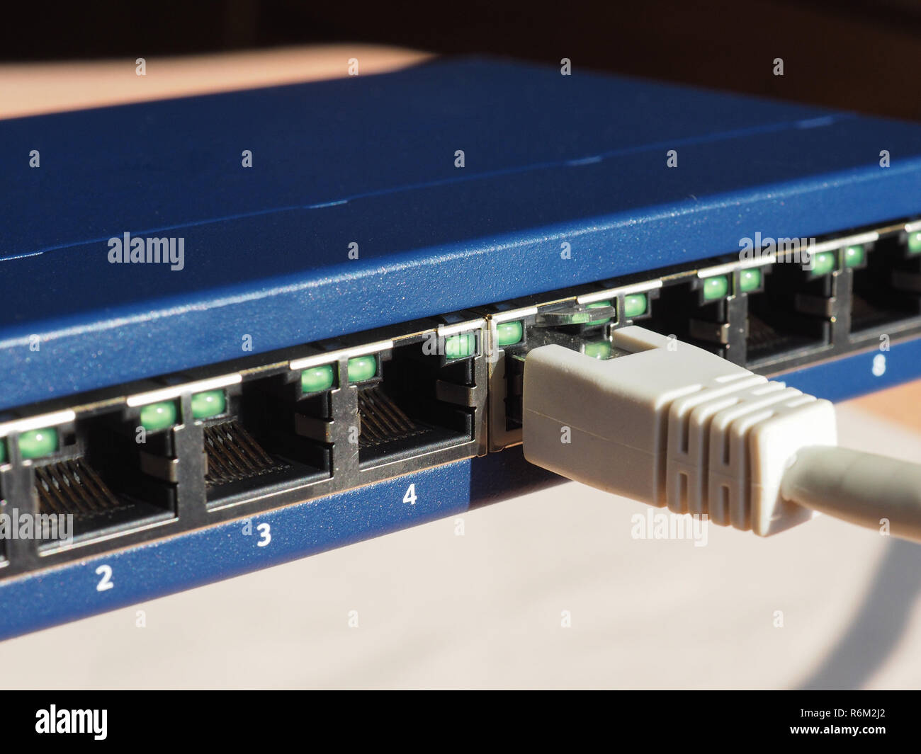 Modem router switch with RJ45 ethernet plug ports Stock Photo - Alamy