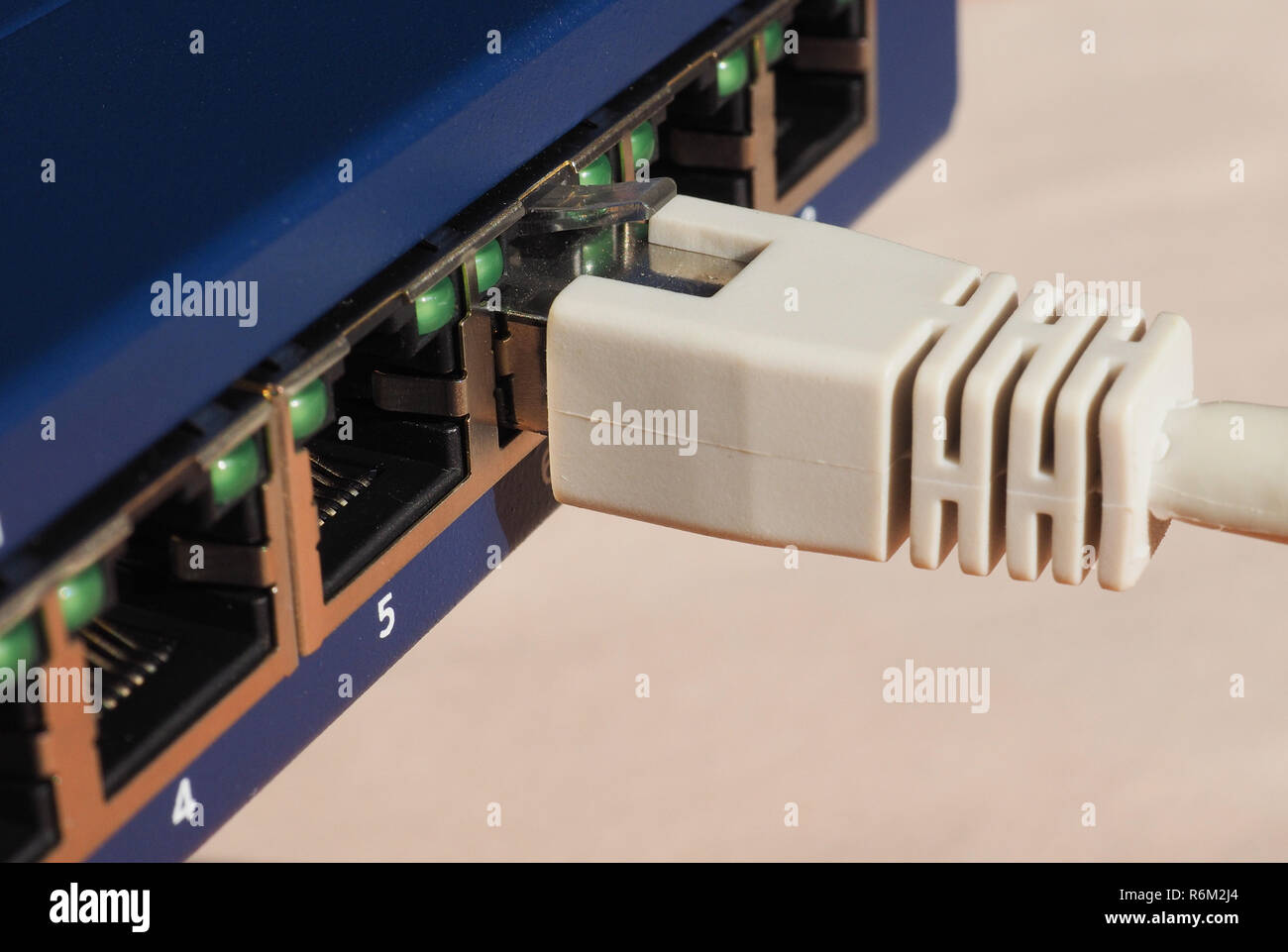 Modem router switch with RJ45 ethernet plug ports Stock Photo - Alamy