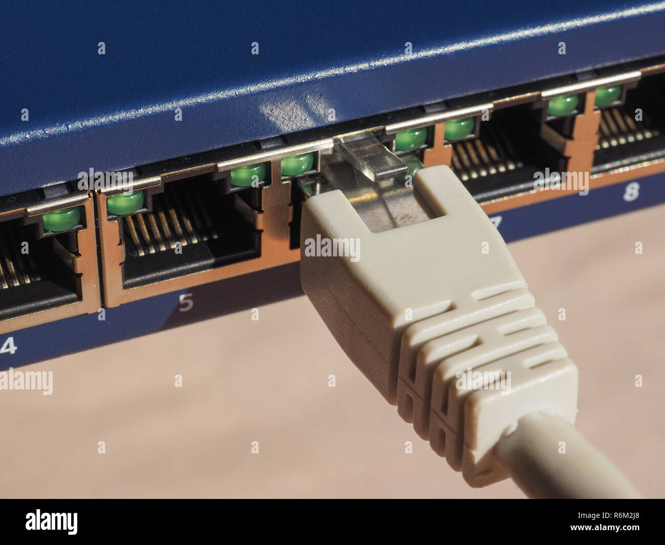 Modem router switch with RJ45 ethernet plug ports Stock Photo - Alamy