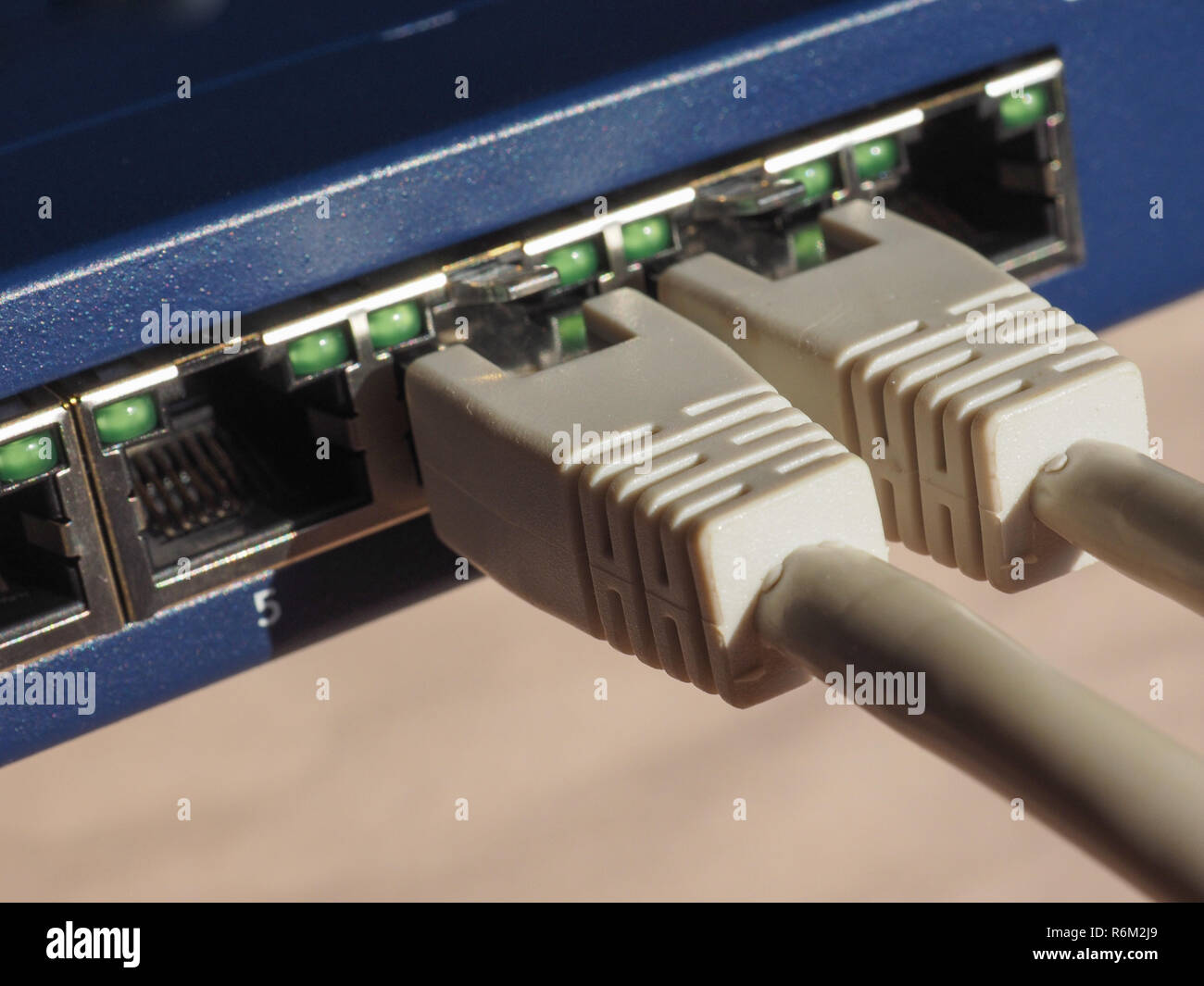 Modem router switch with RJ45 ethernet plug ports Stock Photo - Alamy