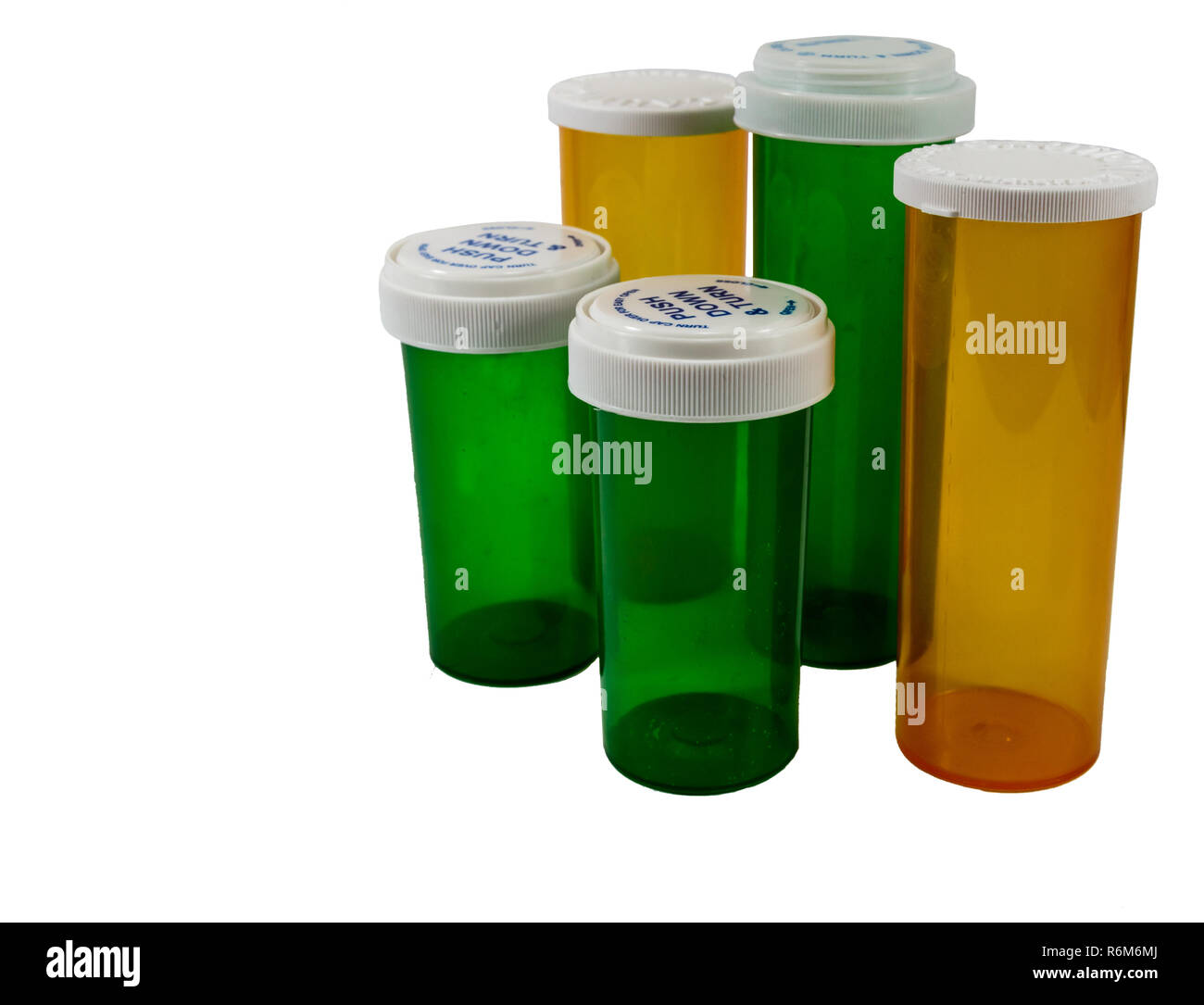 Green and yellow pharmaceutical medicine bottles Stock Photo Alamy