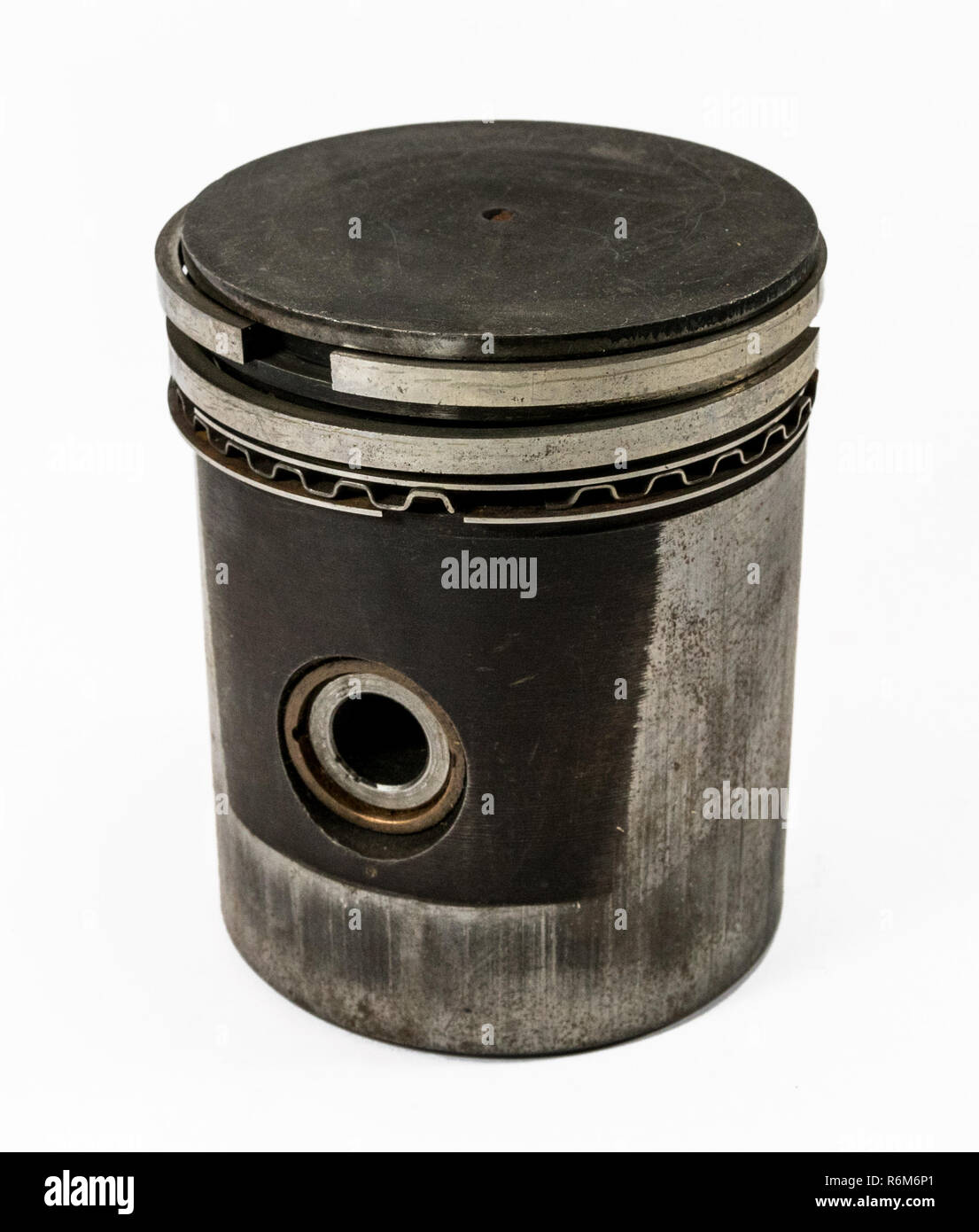 Antique automotive cast iron piston and rings Stock Photo Alamy