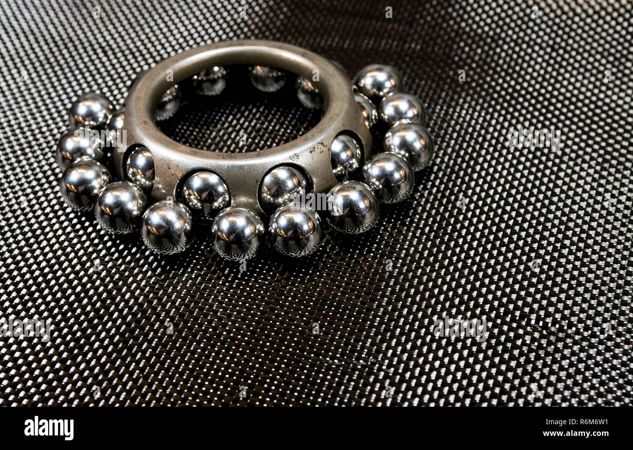 Ball bearings and wheel bearing on carbon fiber cloth Stock Photo Alamy