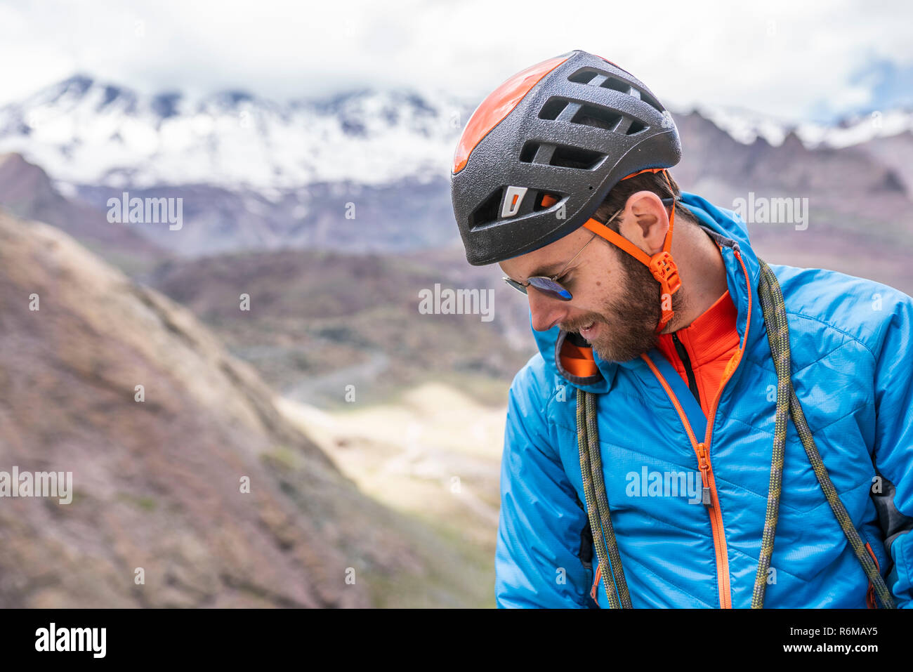 Face expressions while a climber climb a big wall inside the Andes, an