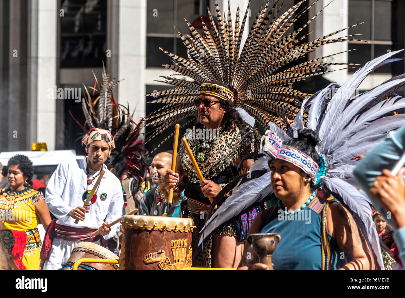 San Francisco, California, USA. 8th September, 2018. Thousands gather in San Francisco in Rise for Climate rally and march in advance of the Global Climate Action Summit to be held there September 12 to 14. A group of Native American people in traiditional regalia play drums during the march down Market Street. Stock Photo