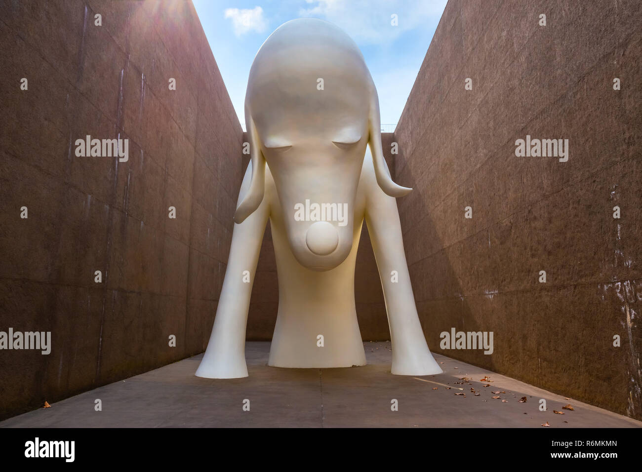 Tokyo, Japan - April 22 2018:  Aomori Dog Statue a gigantic white dog over 8.5 meters tall at The Aomori Museum Stock Photo