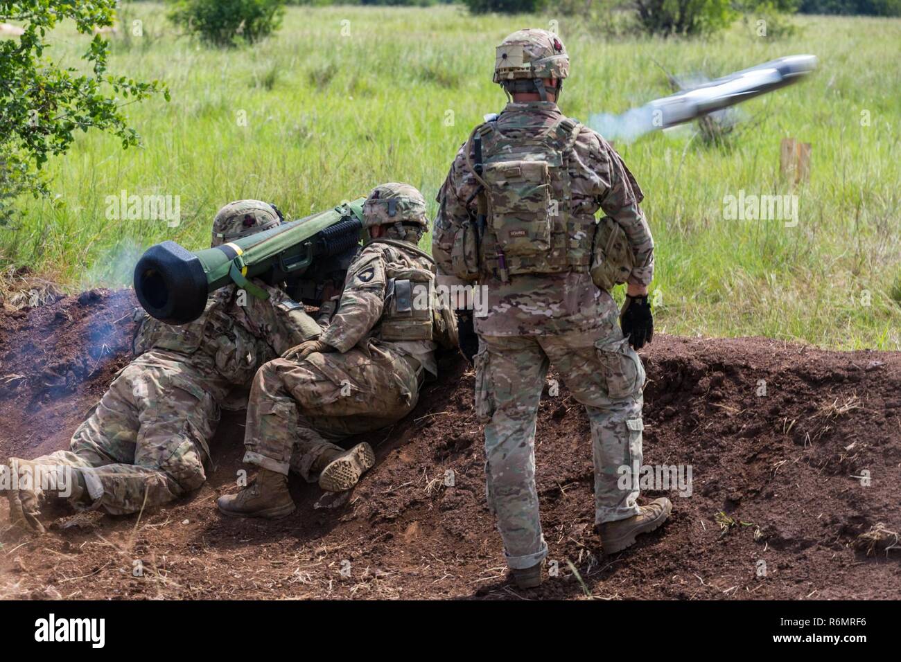 U.S. Army Soldiers assigned to the 1st Battalion, 506th Infantry Regiment, 1st Brigade Combat Team, 101st Airborne Division fire a Javelin shoulder-fired anti-tank missile during United Accord 2017 at Bundase Training Camp, Bundase, Ghana, May 29, 2017. United Accord (formerly Western Accord) 2017 is an annual, combined, joint military exercise that promotes regional relationships, increases capacity, trains U.S. and Western African forces, and encourages cross training and interoperability. Stock Photo